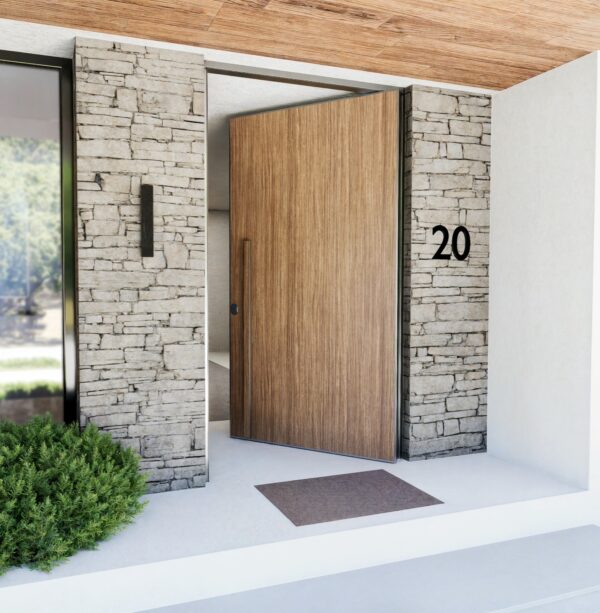 Puerta acorazada pivotante de gran formato en roble